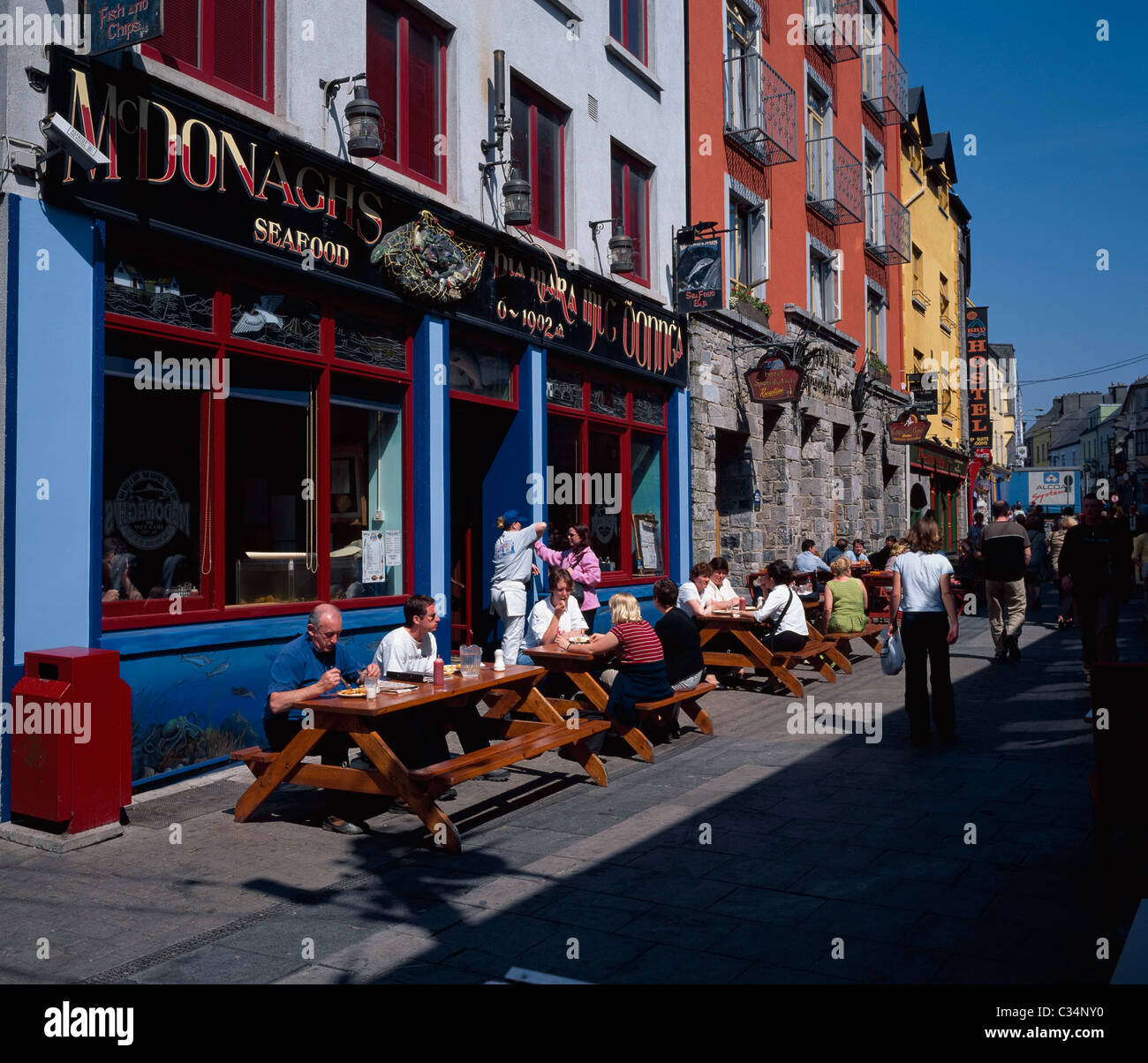 Galway City,Co Galway,Ireland;People Sitting Outside Cafe Stock Photo