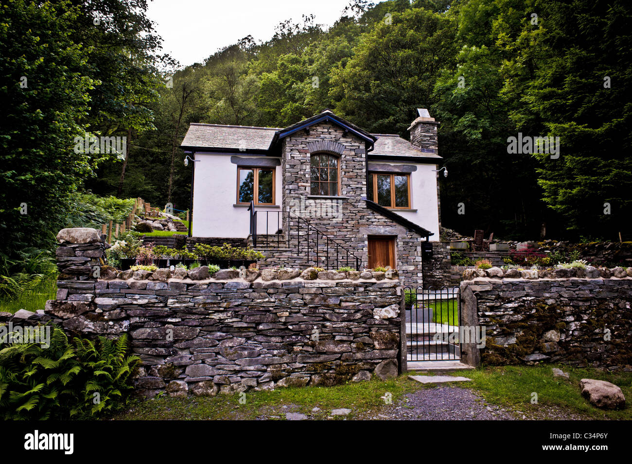 Brooklands Cottage, Isolated dwelling in Moss Rigg Wood, Little Langdale, Cumbria. Stock Photo