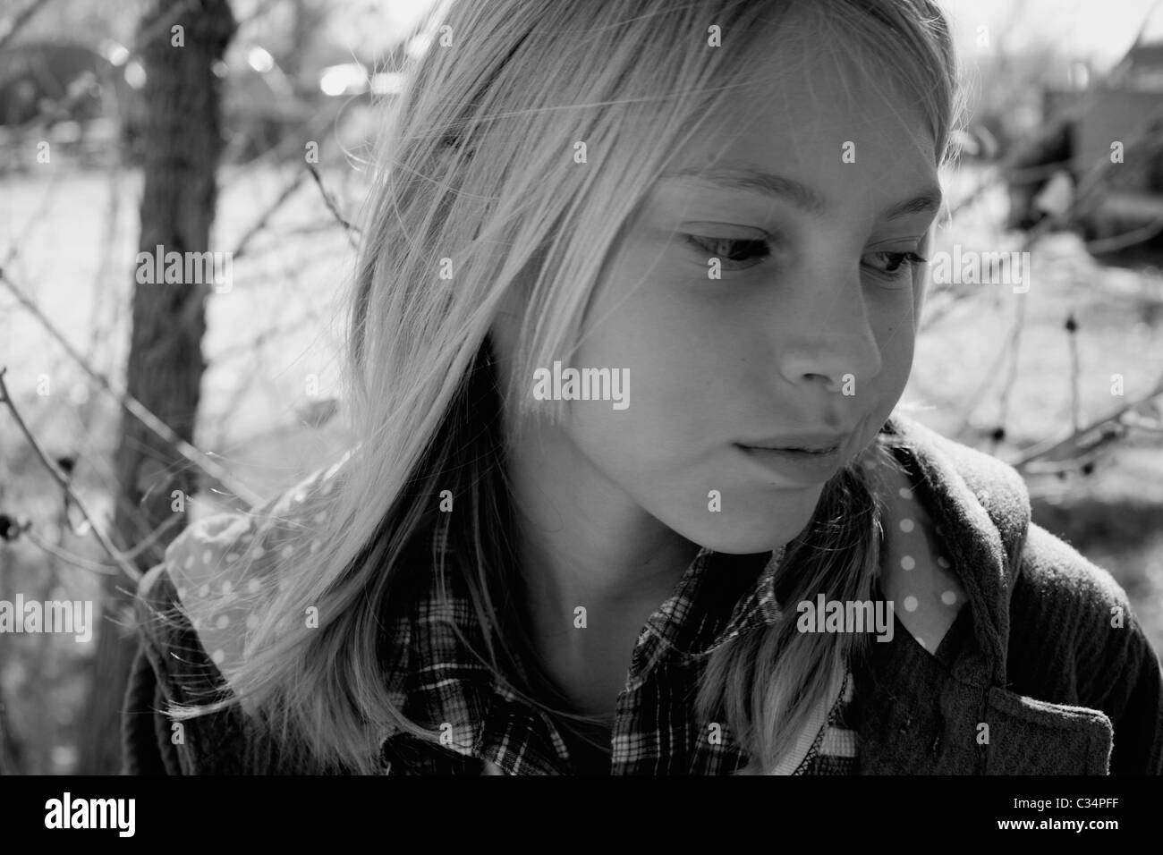 10 year old girl looking Black and White Stock Photos & Images - Alamy
