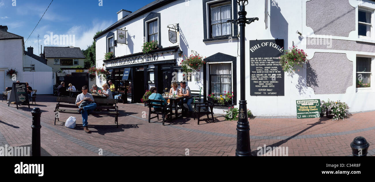 Schull,Co Cork,Ireland;People Sitting Outside The Bunratty Inn Stock Photo