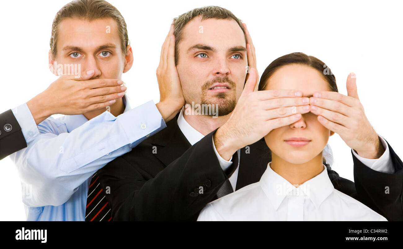 Image of business partners closing eyes, mouth and ears of each other