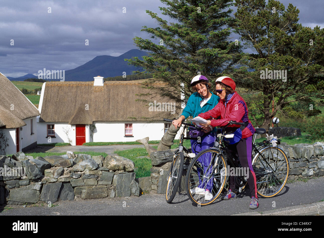 Cyclists, Tully Cross, County Galway, Ireland Stock Photo