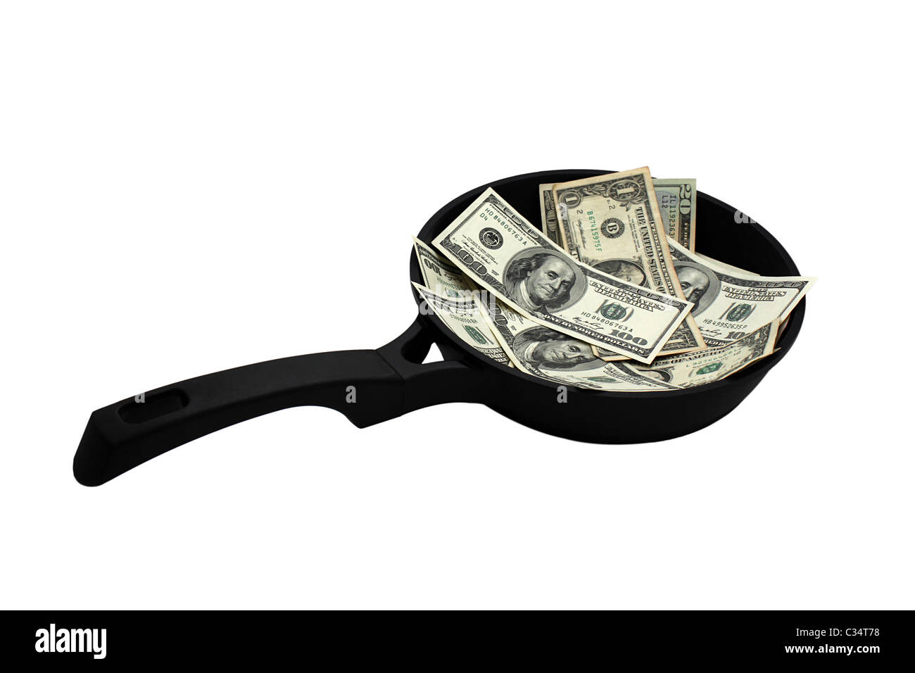 dollars on frying pan Stock Photo