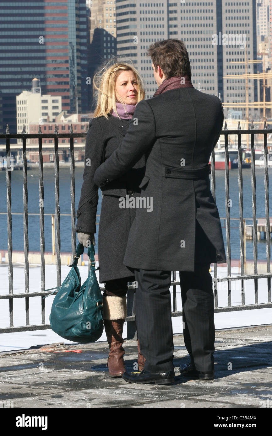 Sarah Lafleur and Eric Mabius filming a scene for 'Ugly Betty' on the