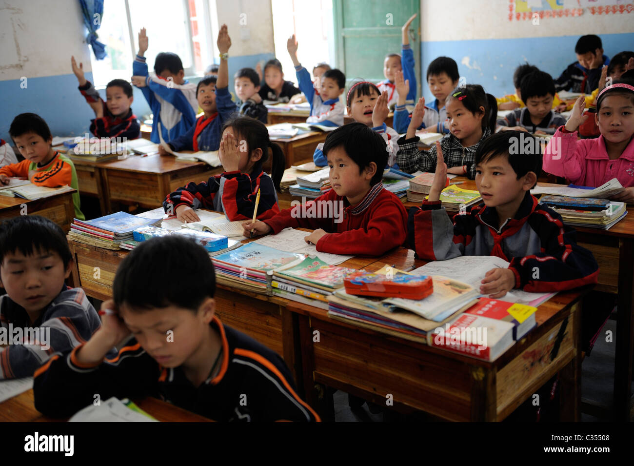 Chinese primary school students attend class in remote countryside in Duan county,  Guangxi, China. 20-Apr-2011 Stock Photo