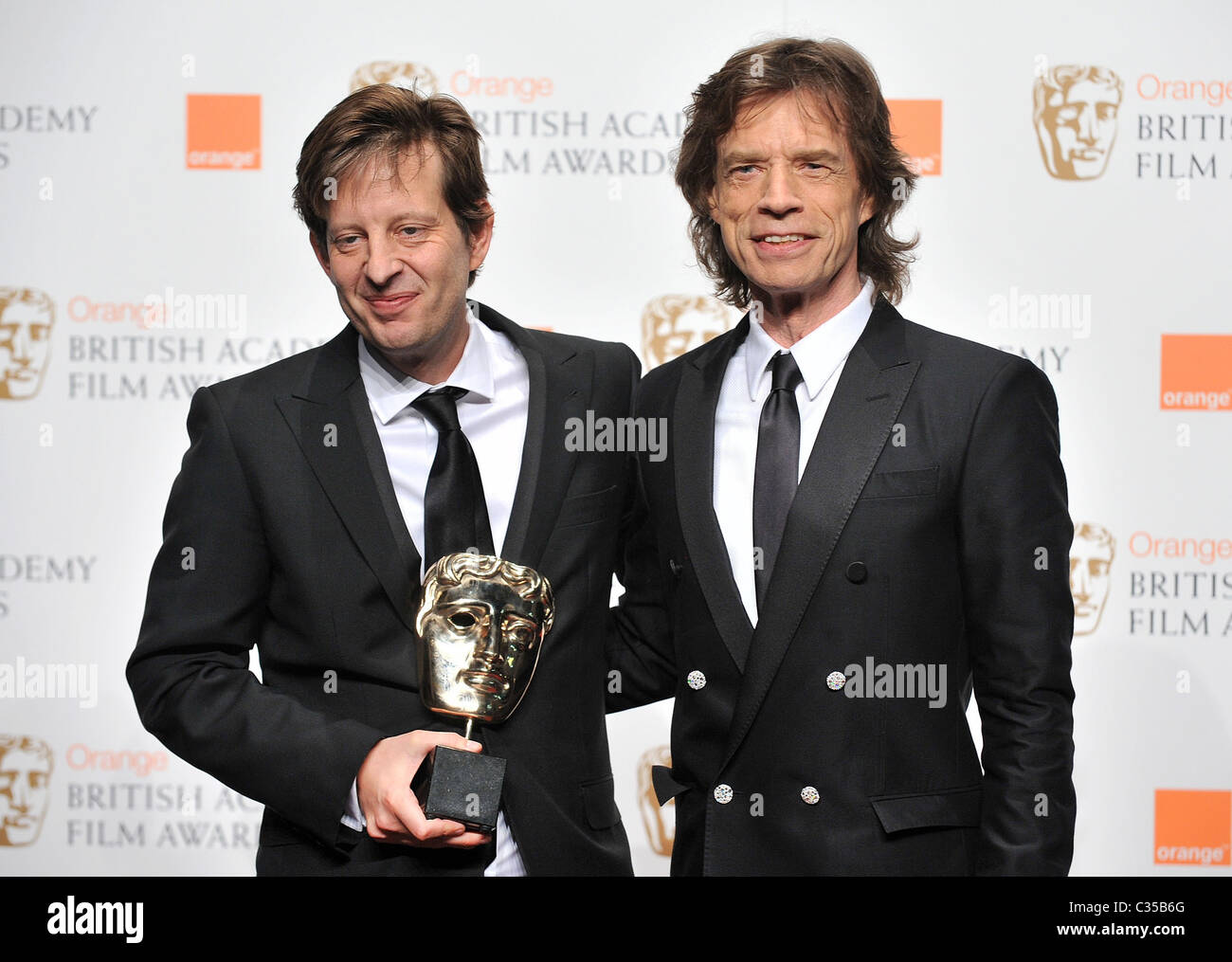 Christian Colson and Mick Jagger The Orange British Academy Film Awards ...