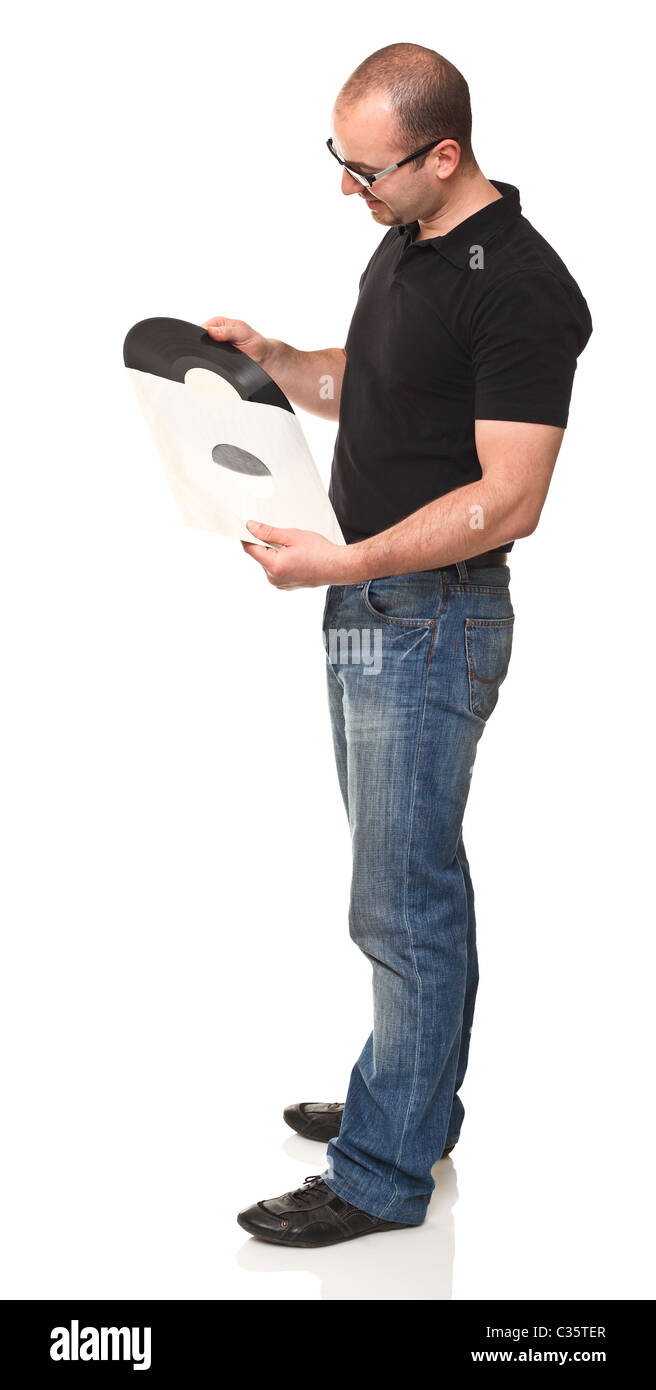 standing man holding vintage lp isolated on white Stock Photo