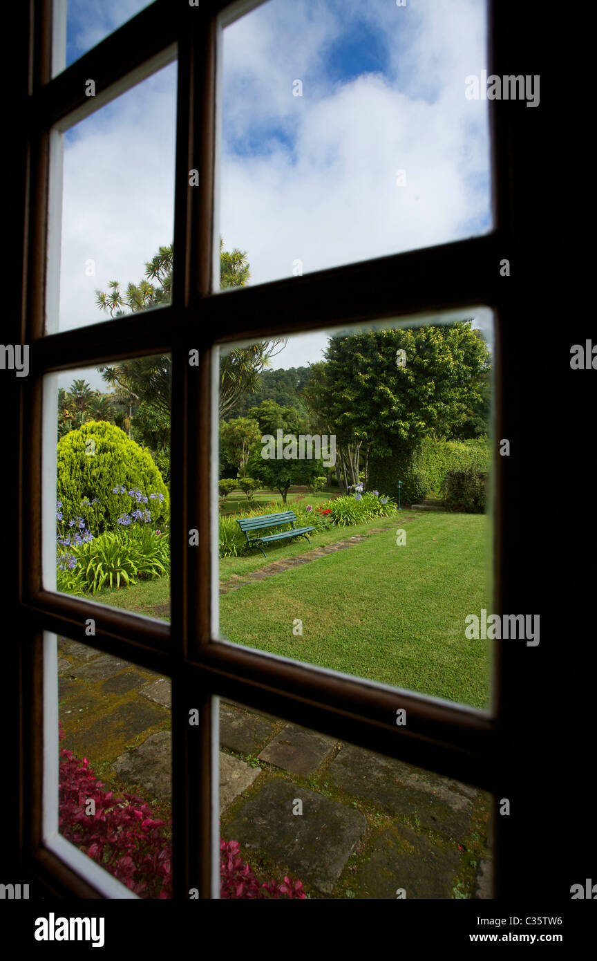 park of Quinta da nasce agua through the window, Angra do Heroismo, Terceira, Azores Island, Portugal, Europe Stock Photo