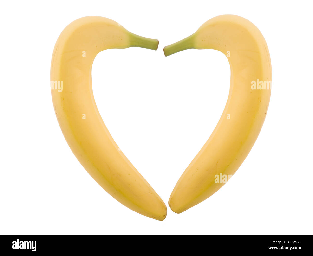 two banana in heart shape on white background Stock Photo Alamy