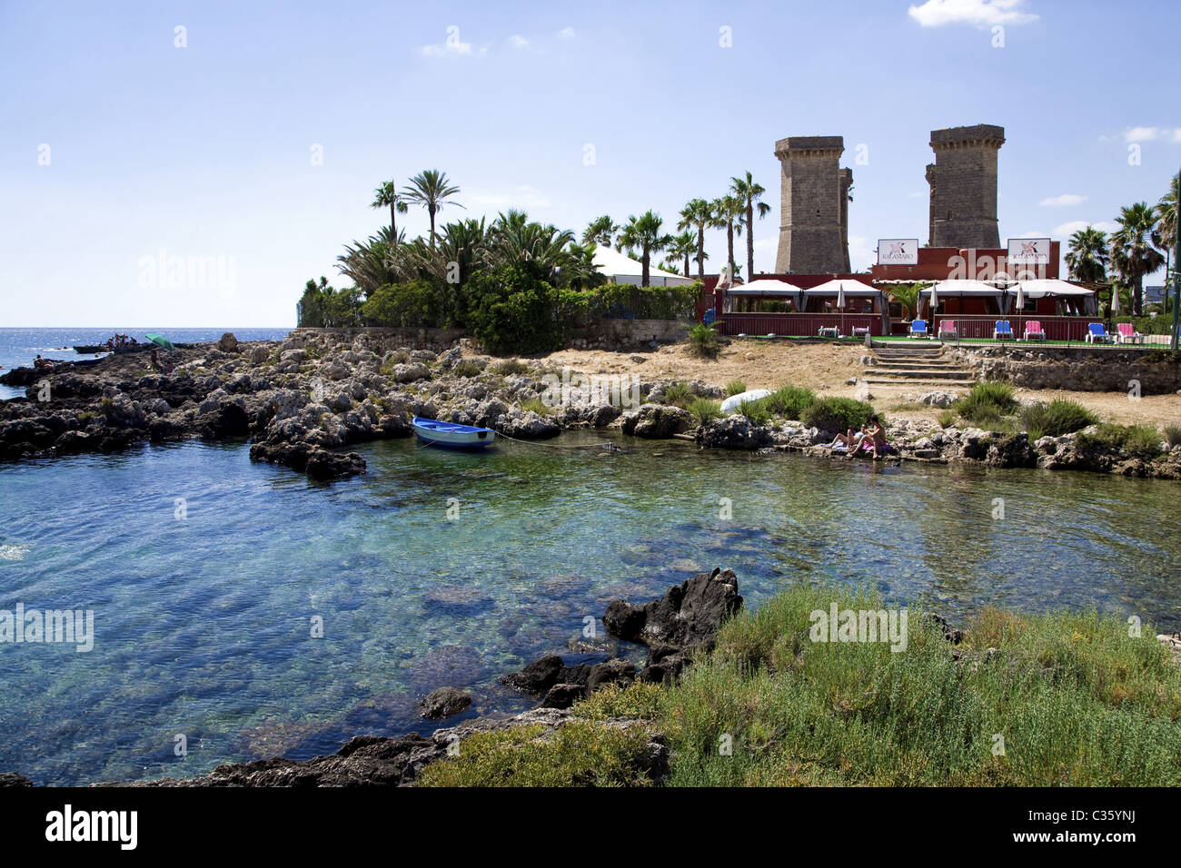 Seaside, in the background Quattro colonne tower, Santa Maria al Bagno,  Salento, Apulia, Italy Stock Photo - Alamy