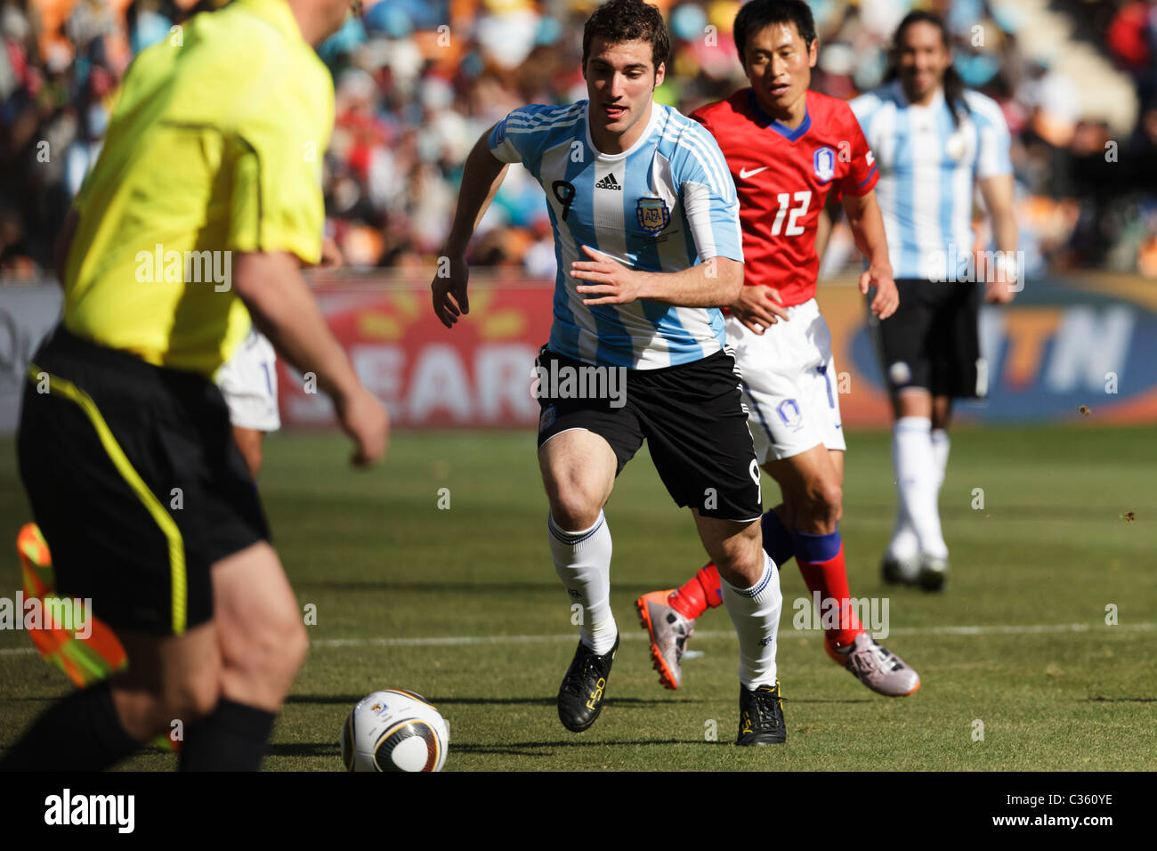 Gonzalo Higuain of Argentina chases the ball during a FIFA World Cup football match against South Korea June 17, 2010. Stock Photo