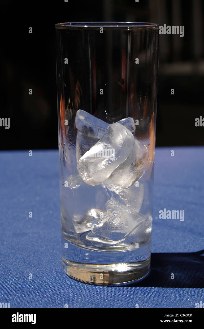 Ice cube glass melt sun hires stock photography and images Alamy