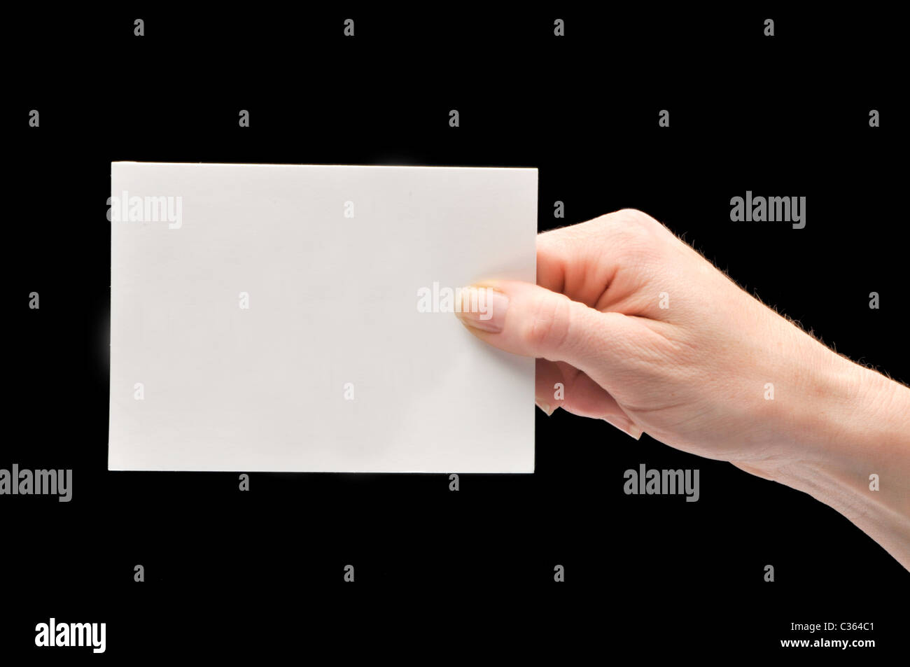 hand holding note card Stock Photo Alamy