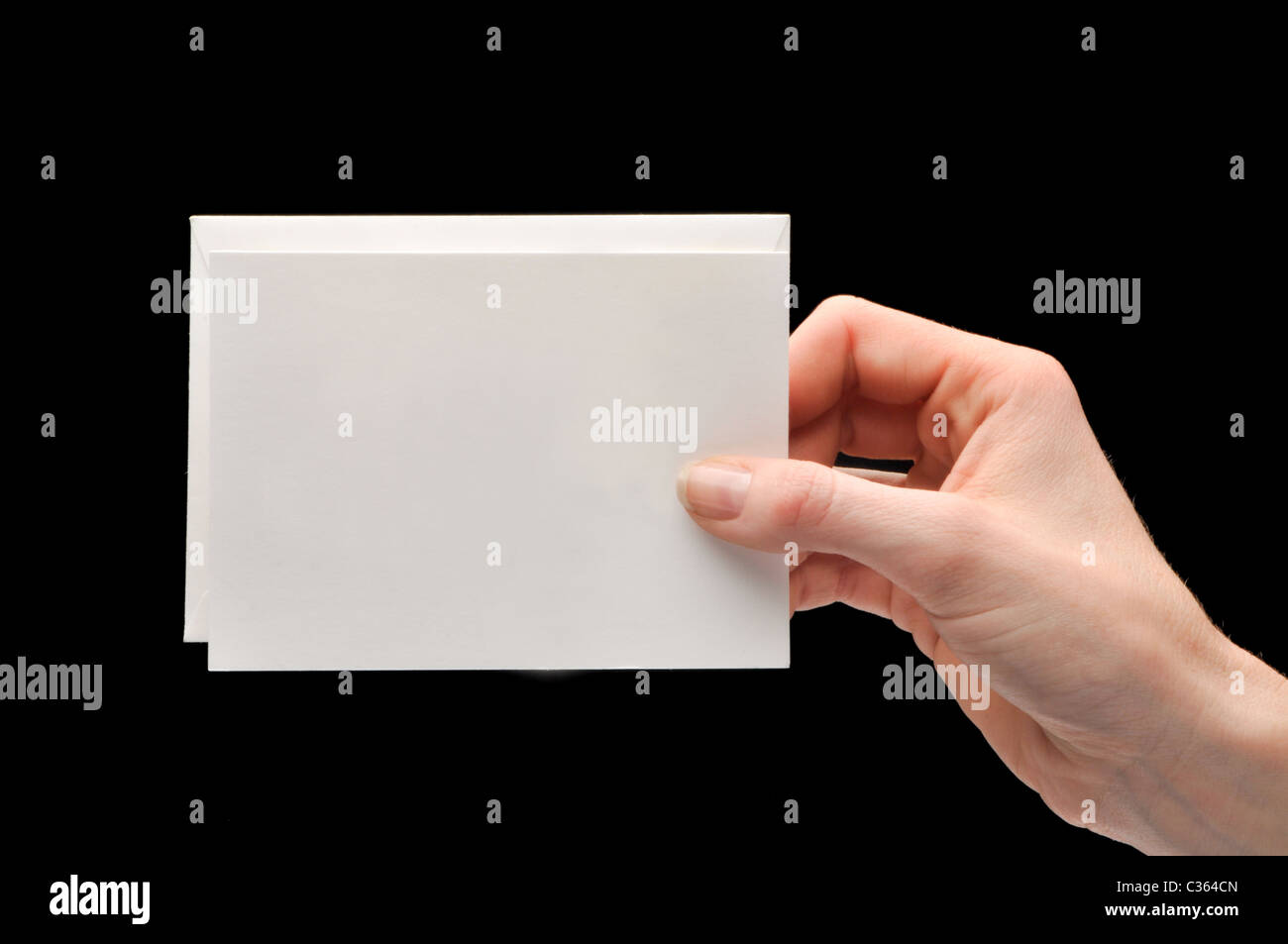 hand holding note card Stock Photo Alamy