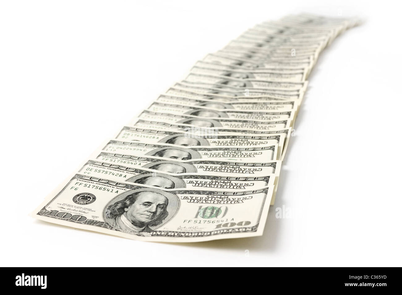 Row of hundred dollar bills isolated on white background Stock Photo