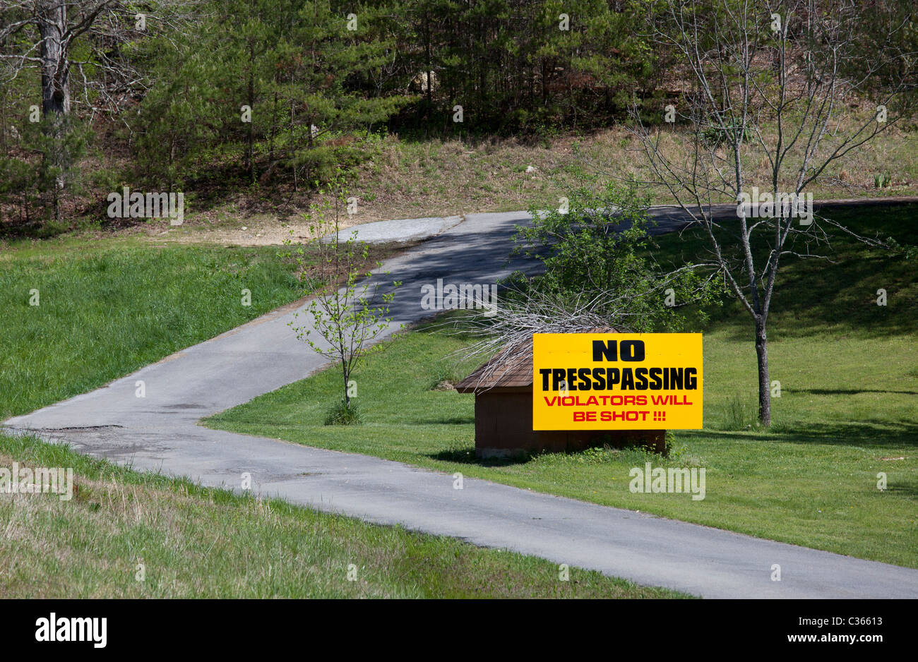 Spring City, Tennessee - A sign on private property warns that trespassers will be shot. Stock Photo