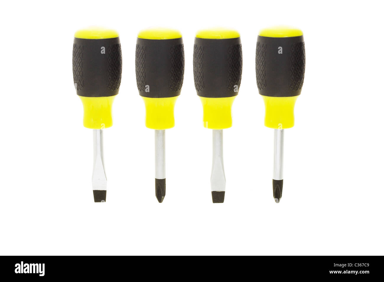 Four screwdrivers standing upright on white background Stock Photo
