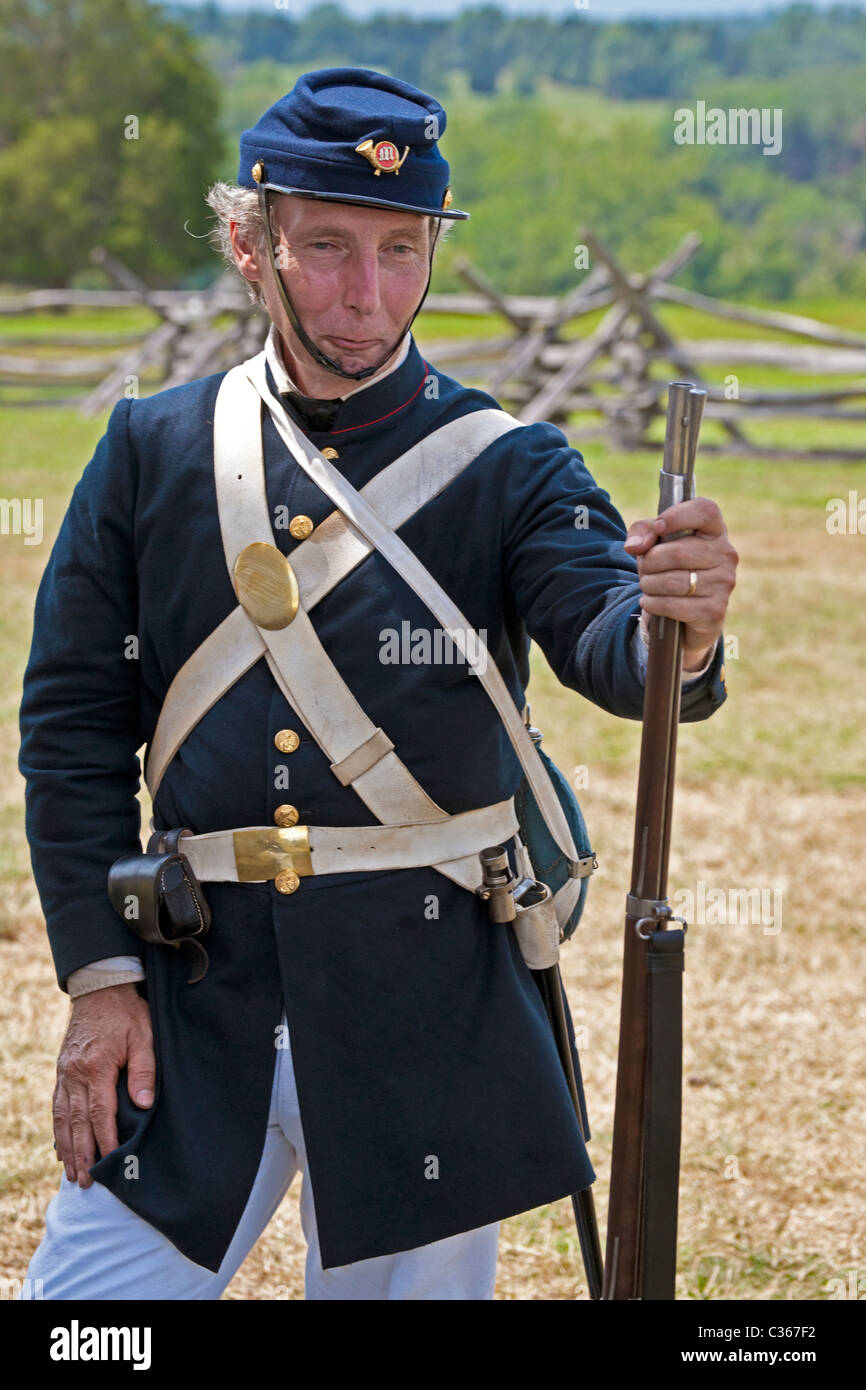Union marine reenactor stands with rifle at his side on the Manassas