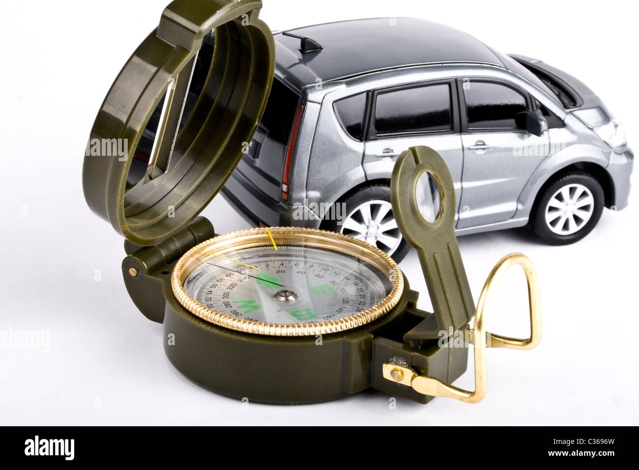 compass and car on a white background Stock Photo Alamy
