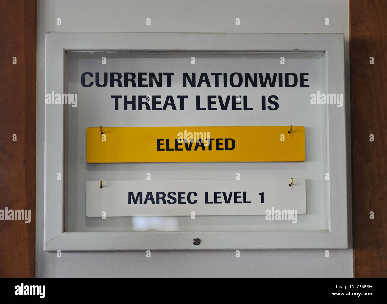 Sign nationwide threat level elevated yellow per old Homeland Security Advisory System HSAS replaced on April 26 2011 by NTAS Stock Photo