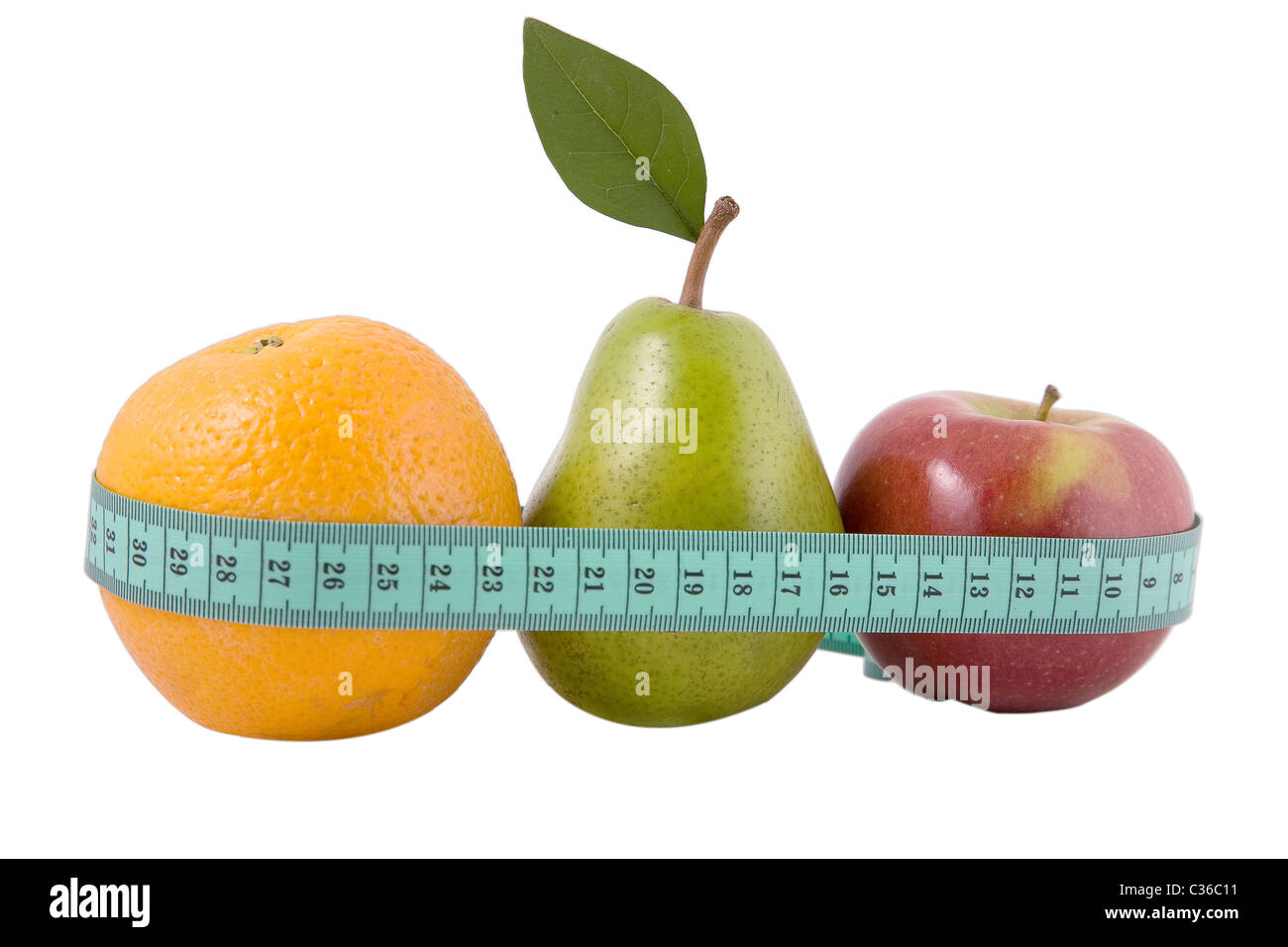 orange, pear and red apple with measurement tape on white background, healthy lifestyle concept Stock Photo