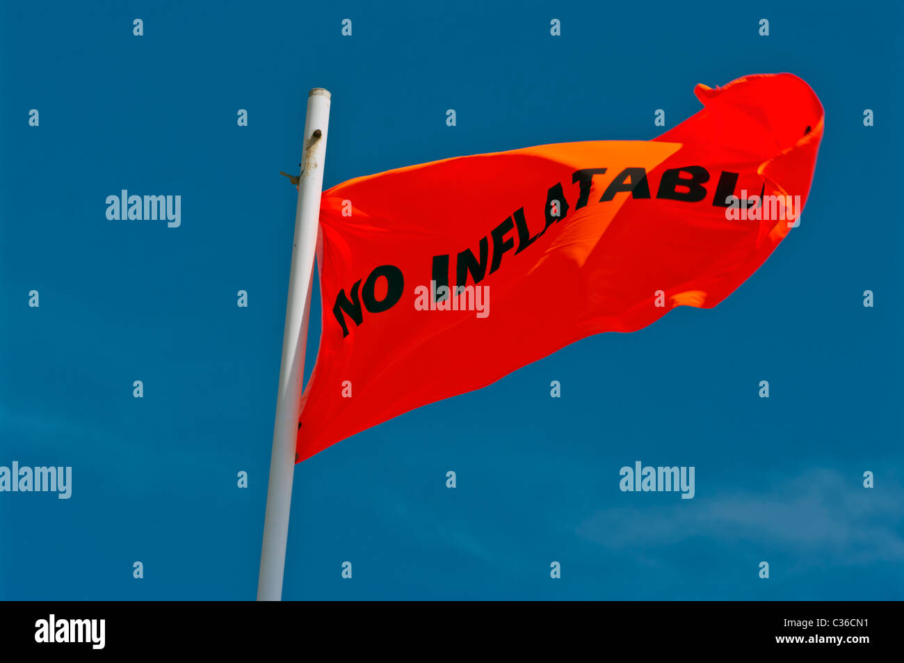 No Inflatables Orange Beach warning Flag uk Stock Photo - Alamy