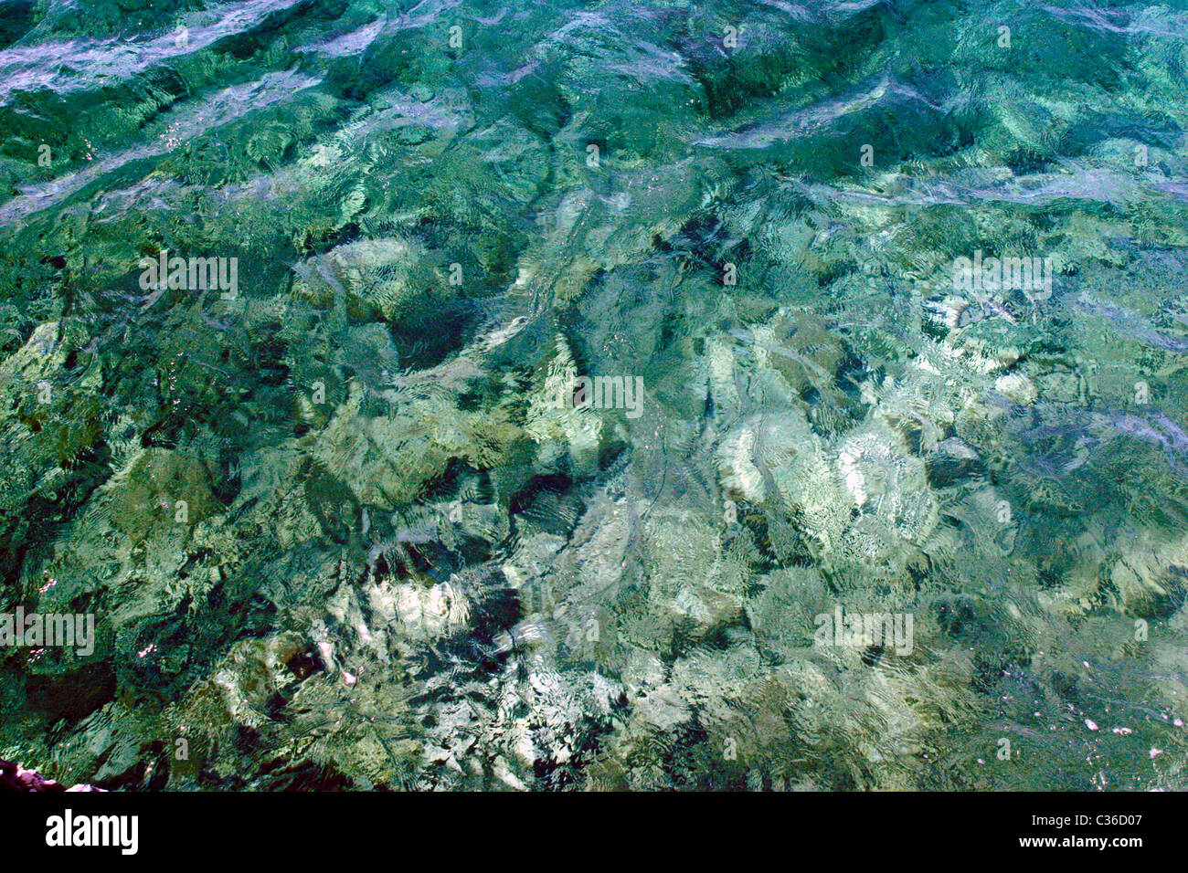 abstract patterns in the sea off Gaios on the Greek island of Paxos. Stock Photo