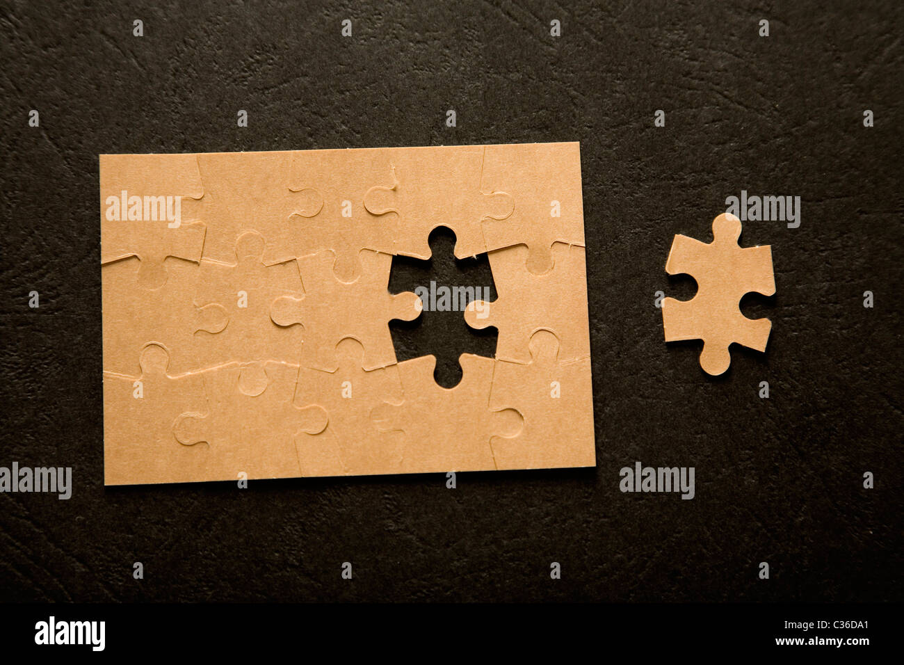 The last piece of a puzzle game, details Stock Photo Alamy