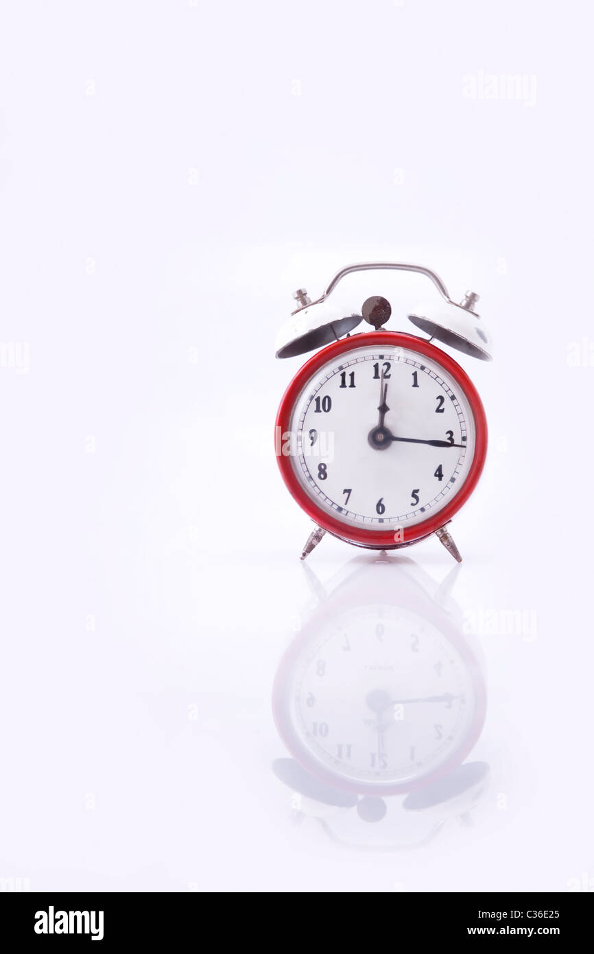 vintage ALARM CLOCK isolated on white background Stock Photo - Alamy