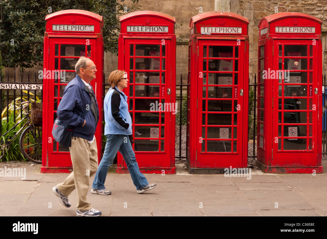 Four old red telephone boxes in Cambridge , Cambridgeshire , England , Britain , Uk Stock Photo