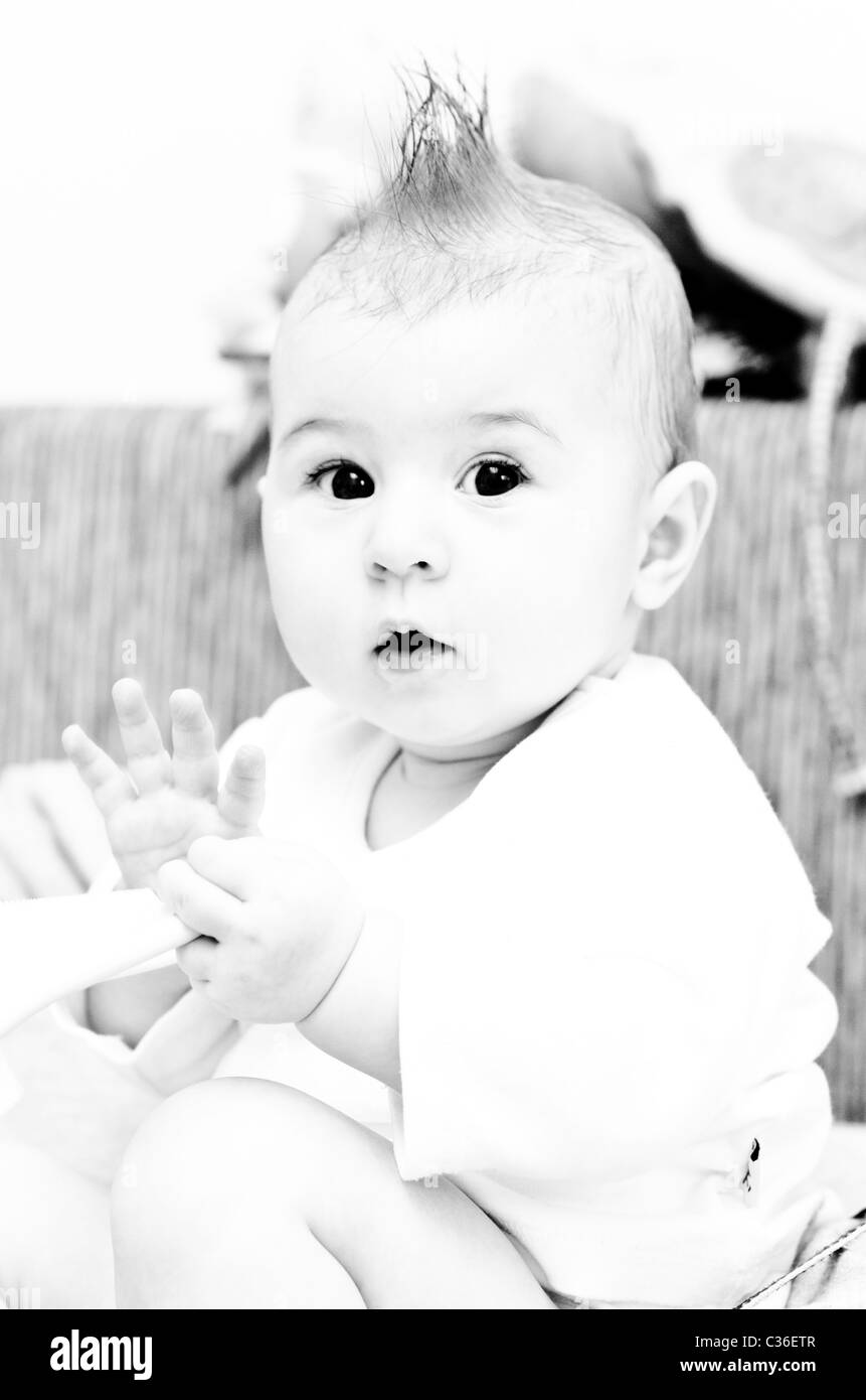 Baby with funny hair Stock Photo Alamy