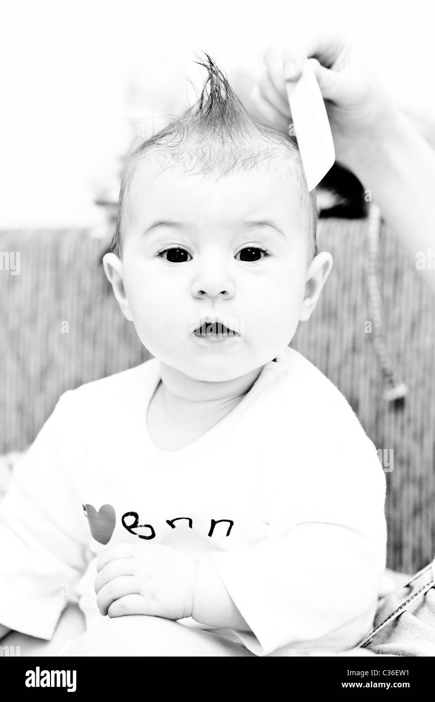 Baby with funny hair Stock Photo Alamy