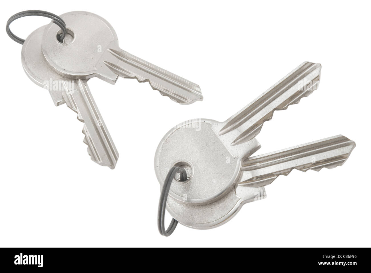 silver bunch of keys on white background Stock Photo