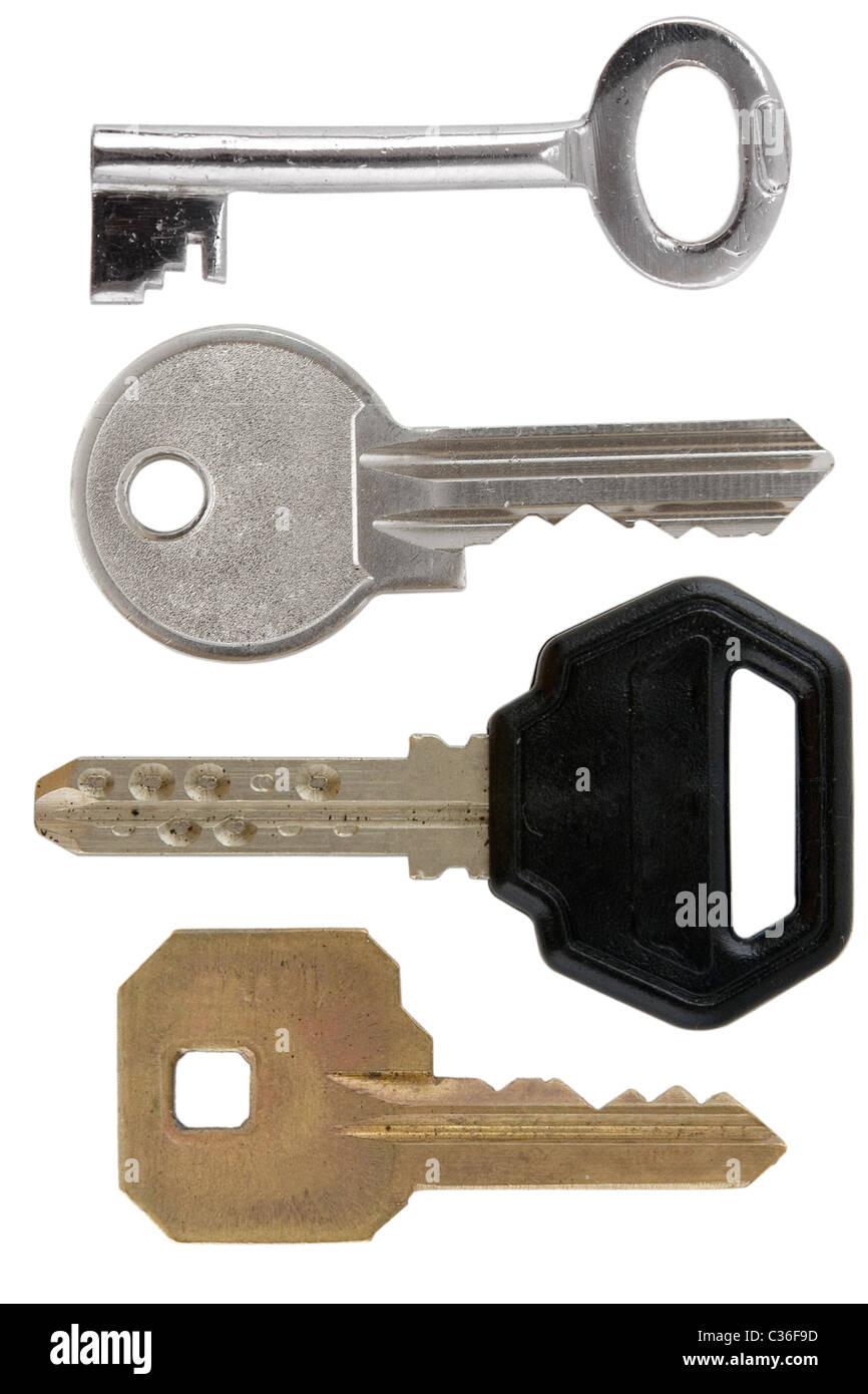 different shape of keys on white background Stock Photo - Alamy