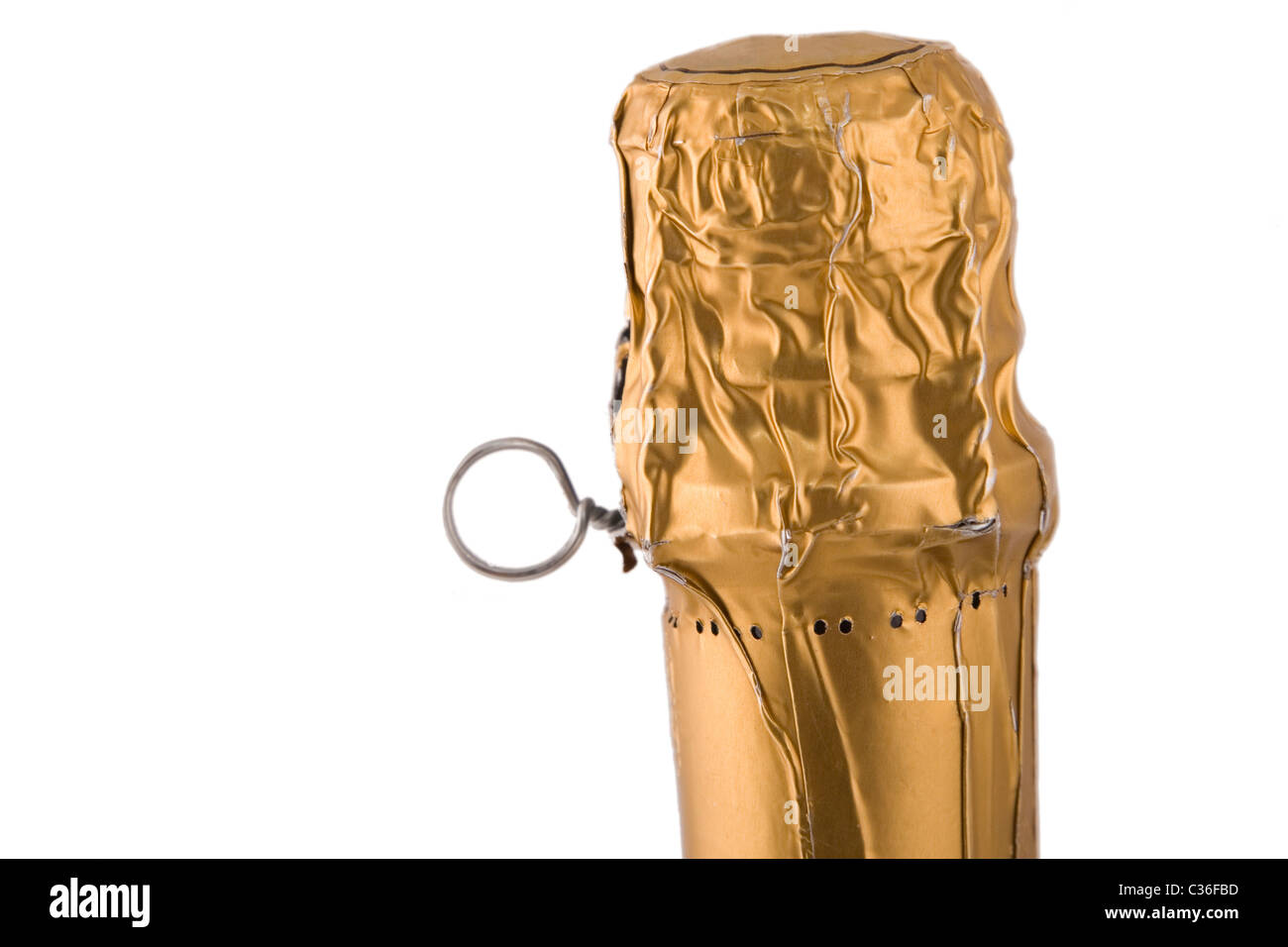 golden cork from luxury champagne, ready to open Stock Photo Alamy
