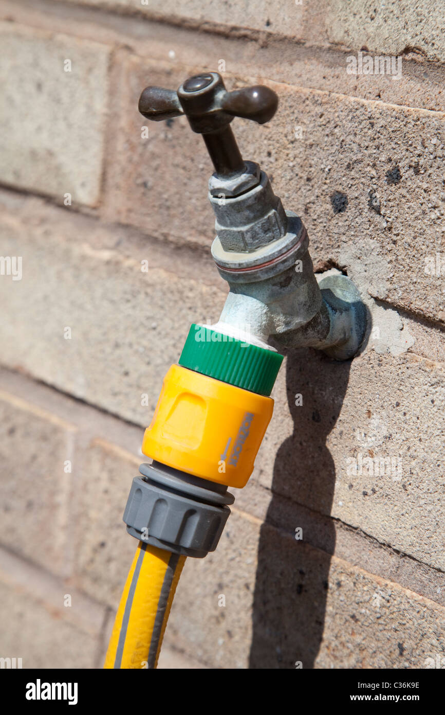 An outside water tap with copy space England UK Stock Photo - Alamy