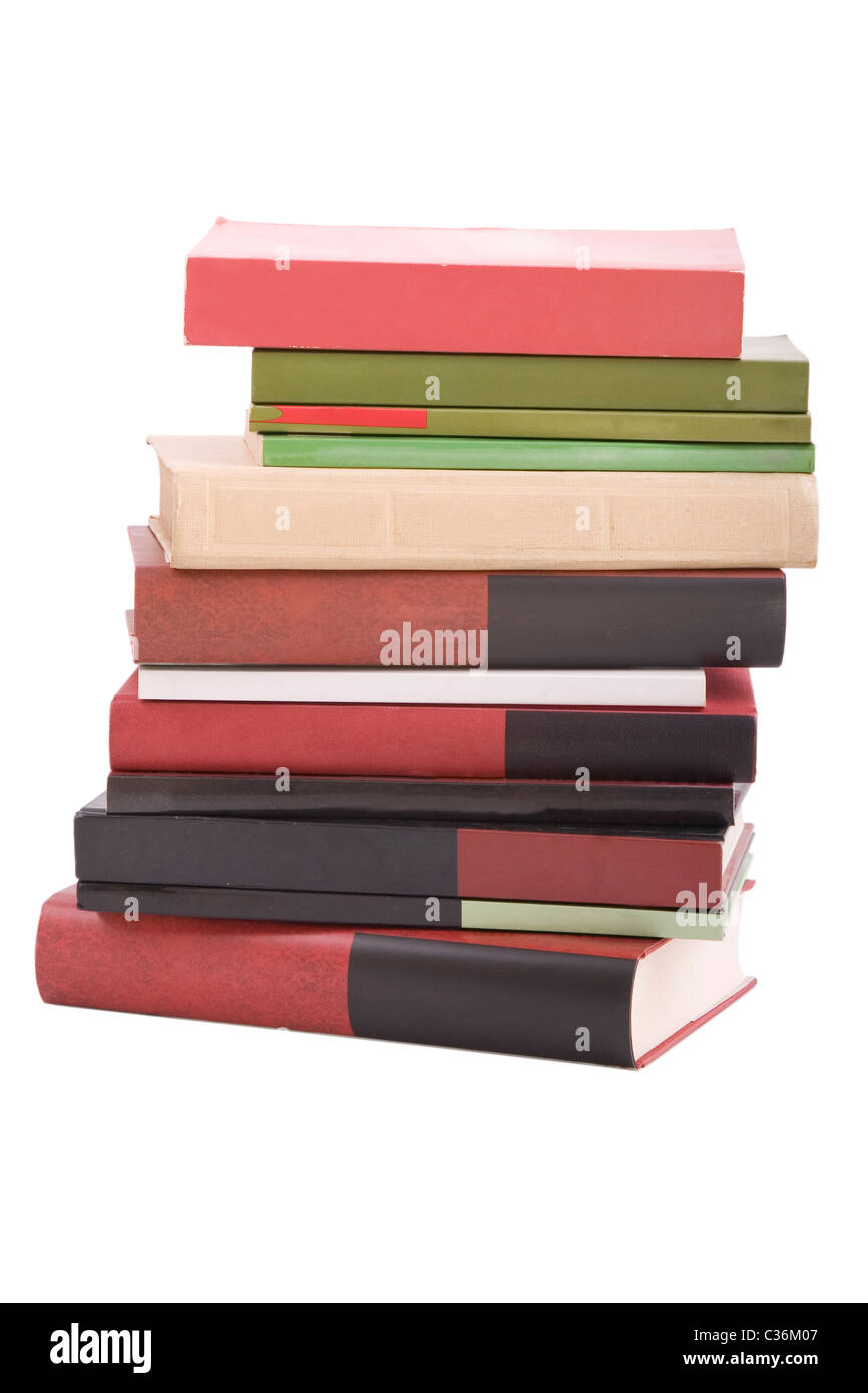 color tower books on white background arranged in stack Stock Photo