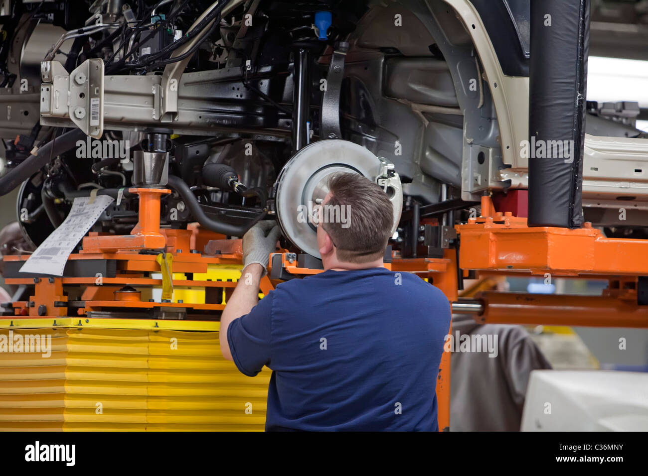 Detroit, Michigan A worker on the assembly line at Chrysler's