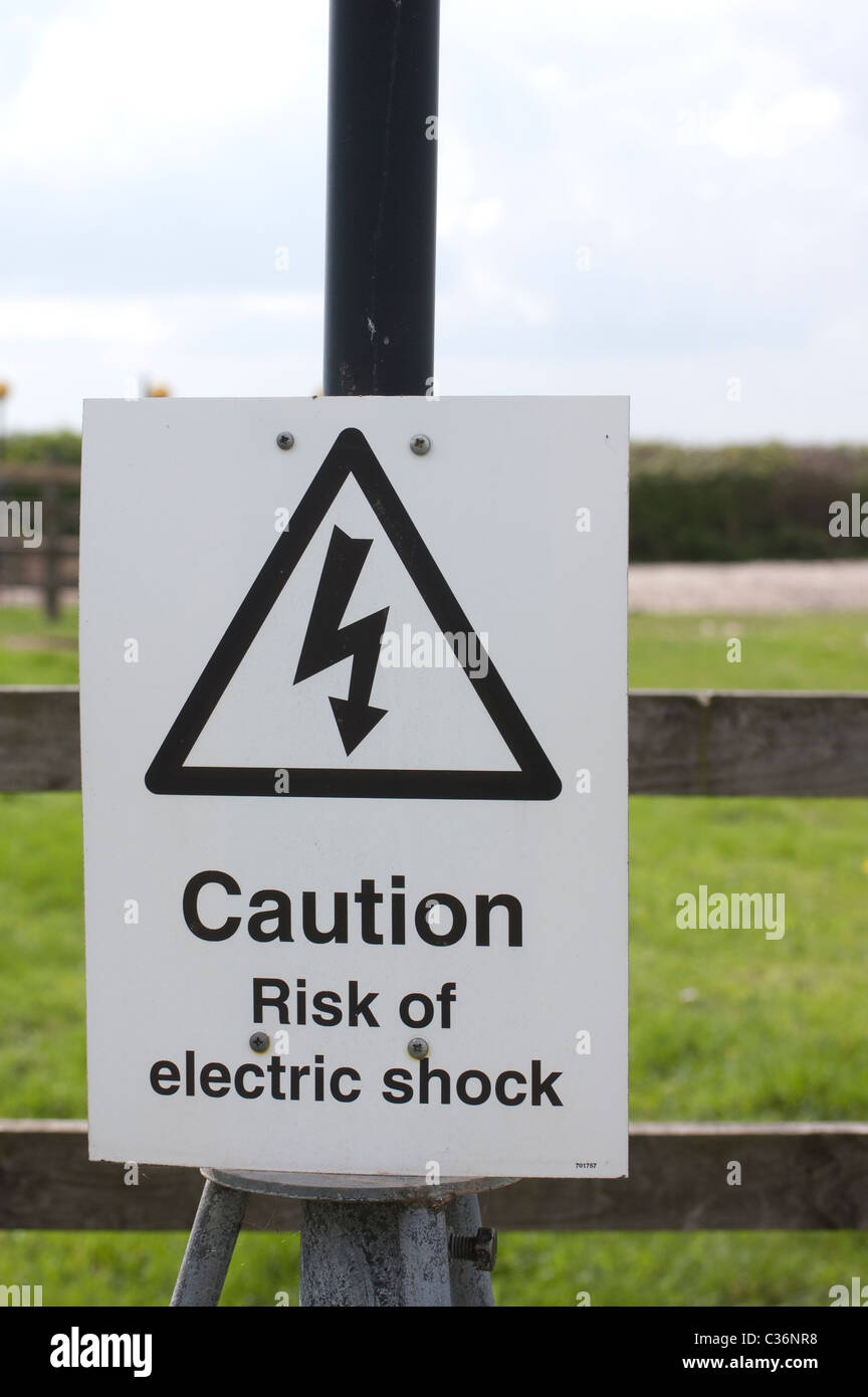 Warning Sign on and electrical installation Stock Photo