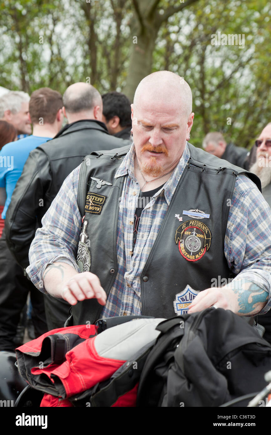 A biker, member of the blue Angels and of the Heritage Motor Cycle Club at the Yorkhill Easter Egg Run 2011, Glasgow, Scotland Stock Photo
