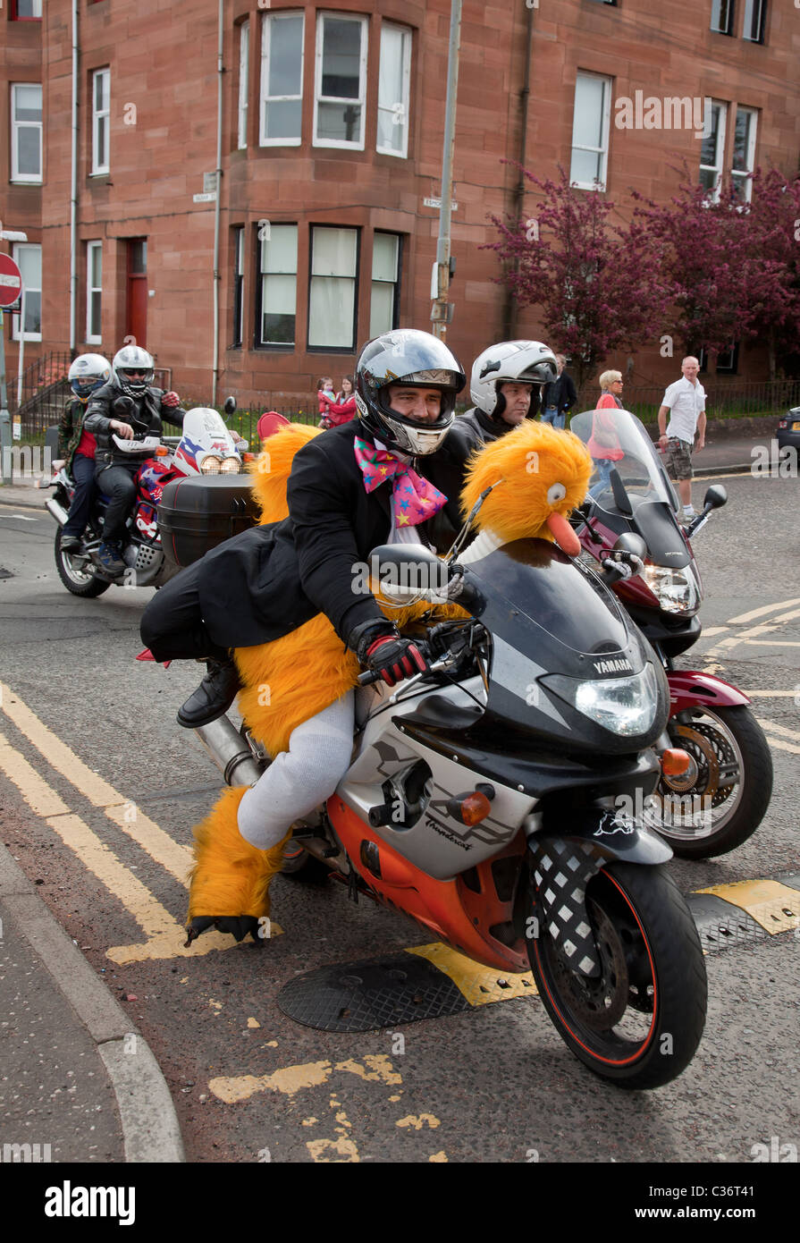 Biker in fancy dress taking part in the annual Yorkhill Easter Egg Run in aid of Yorkhill Sick Kids hospital Glasgow Scotland Stock Photo Alamy