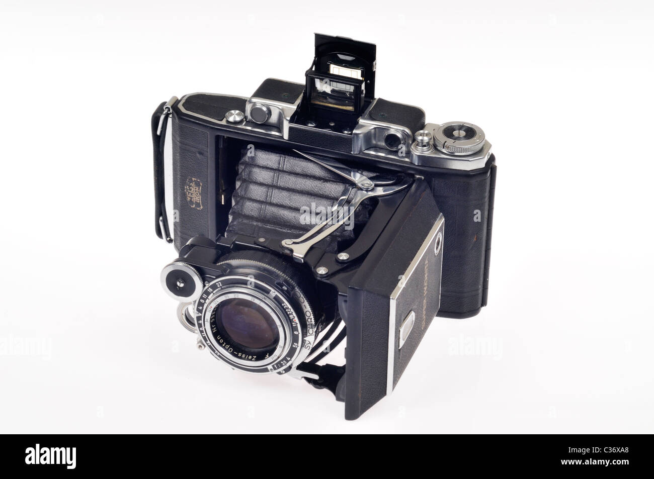 Antique Zeiss Super Ikonta medium format bellows camera on white Stock Photo