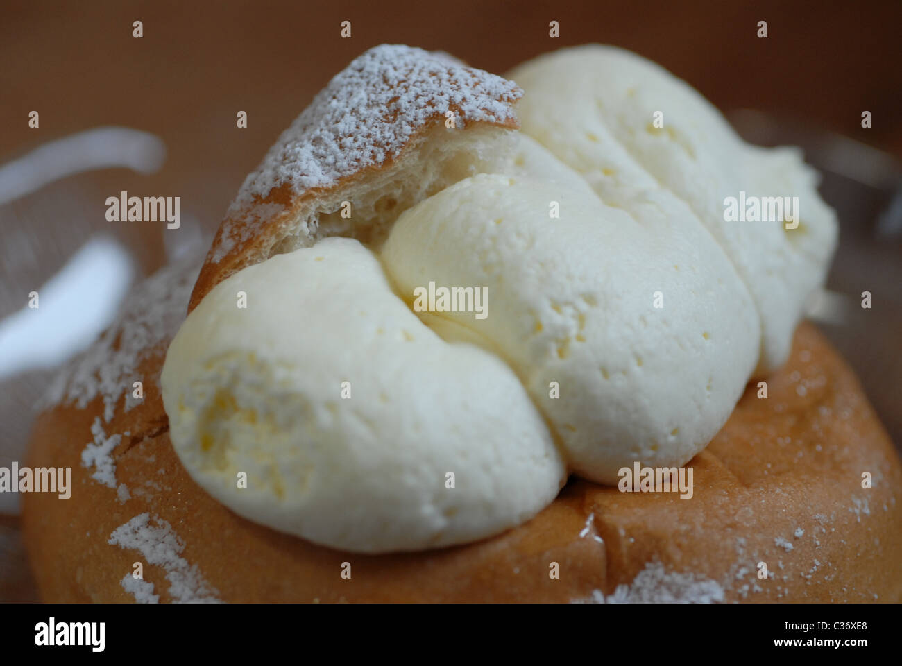 Semla, Swedish Easter bun with whipped cream and almond paste. Stock Photo