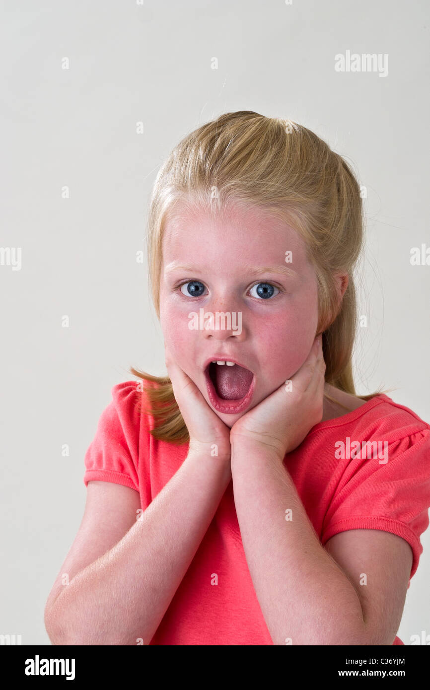 5-6 year old girl making face. MR © Myrleen Pearson Stock Photo