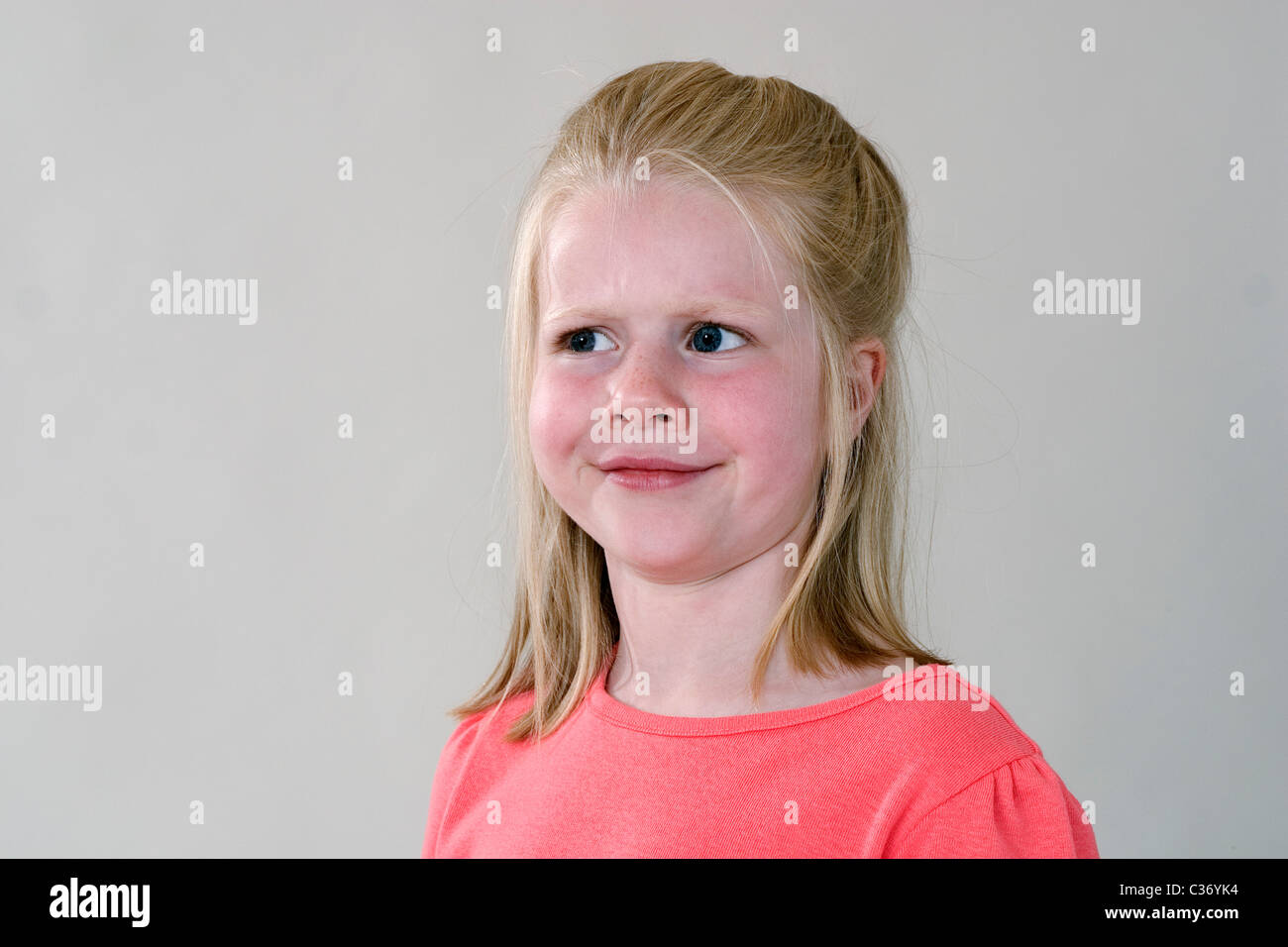 Goofy face 5-6 year old girl. MR © Myrleen Pearson Stock Photo