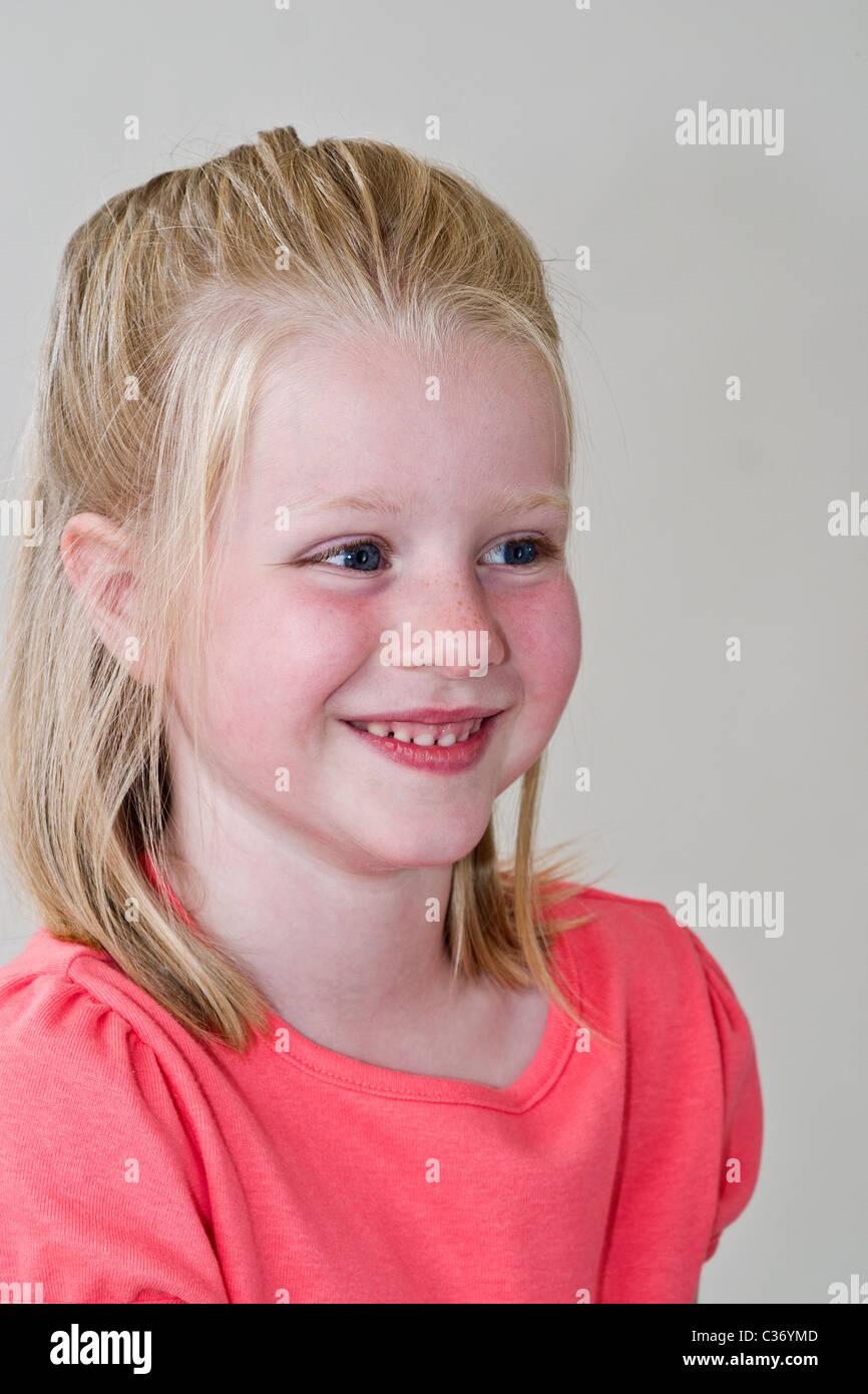 Pleased young girl smiling  5-6 year old girl. MR © Myrleen Pearson Stock Photo