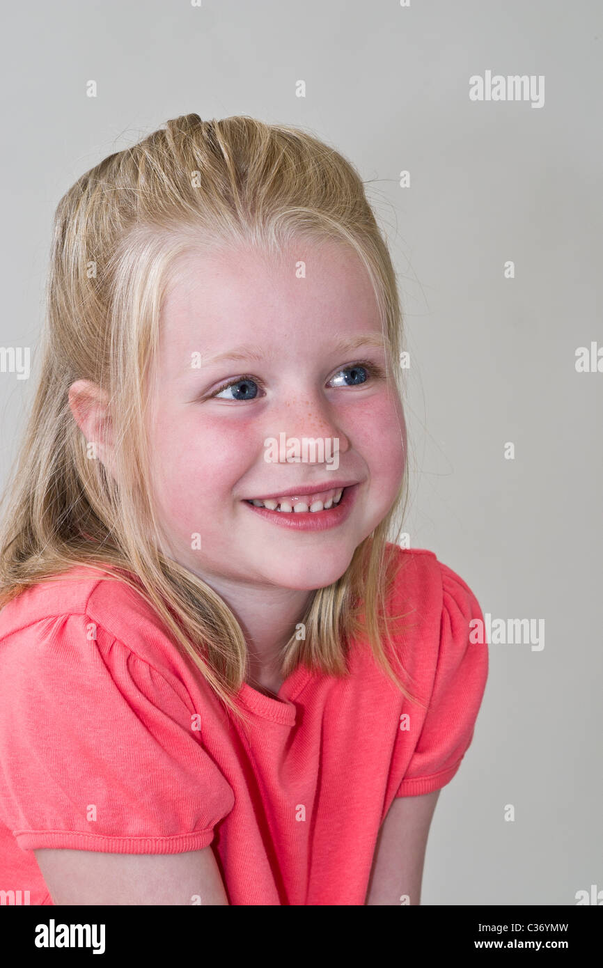 happy Thrilled  young girl smiling child anticipating surprise 5-6 year old girl. MR © Myrleen Pearson Stock Photo