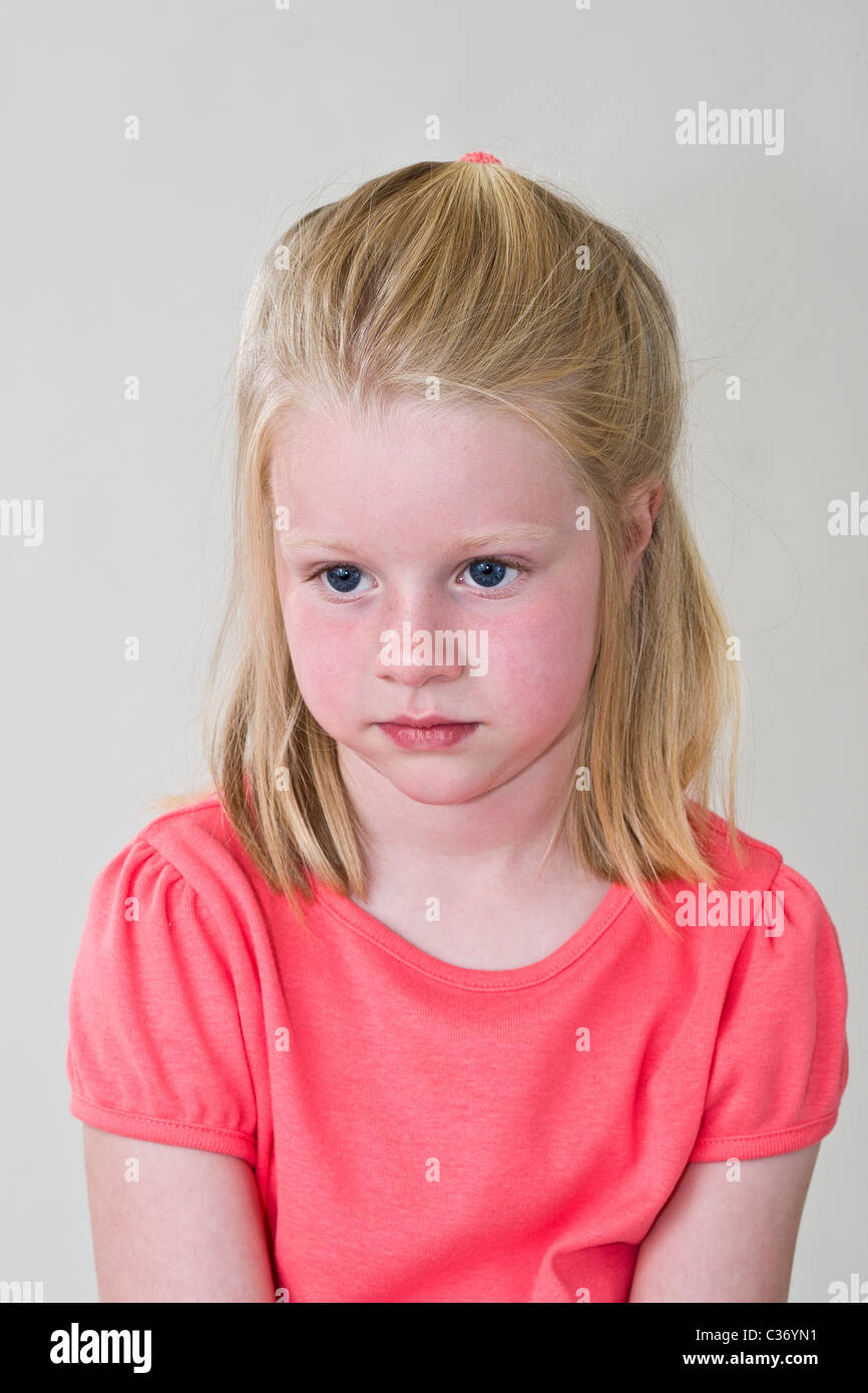 Young girl feels sorry for herself 6 year old girl. MR © Myrleen Pearson Stock Photo
