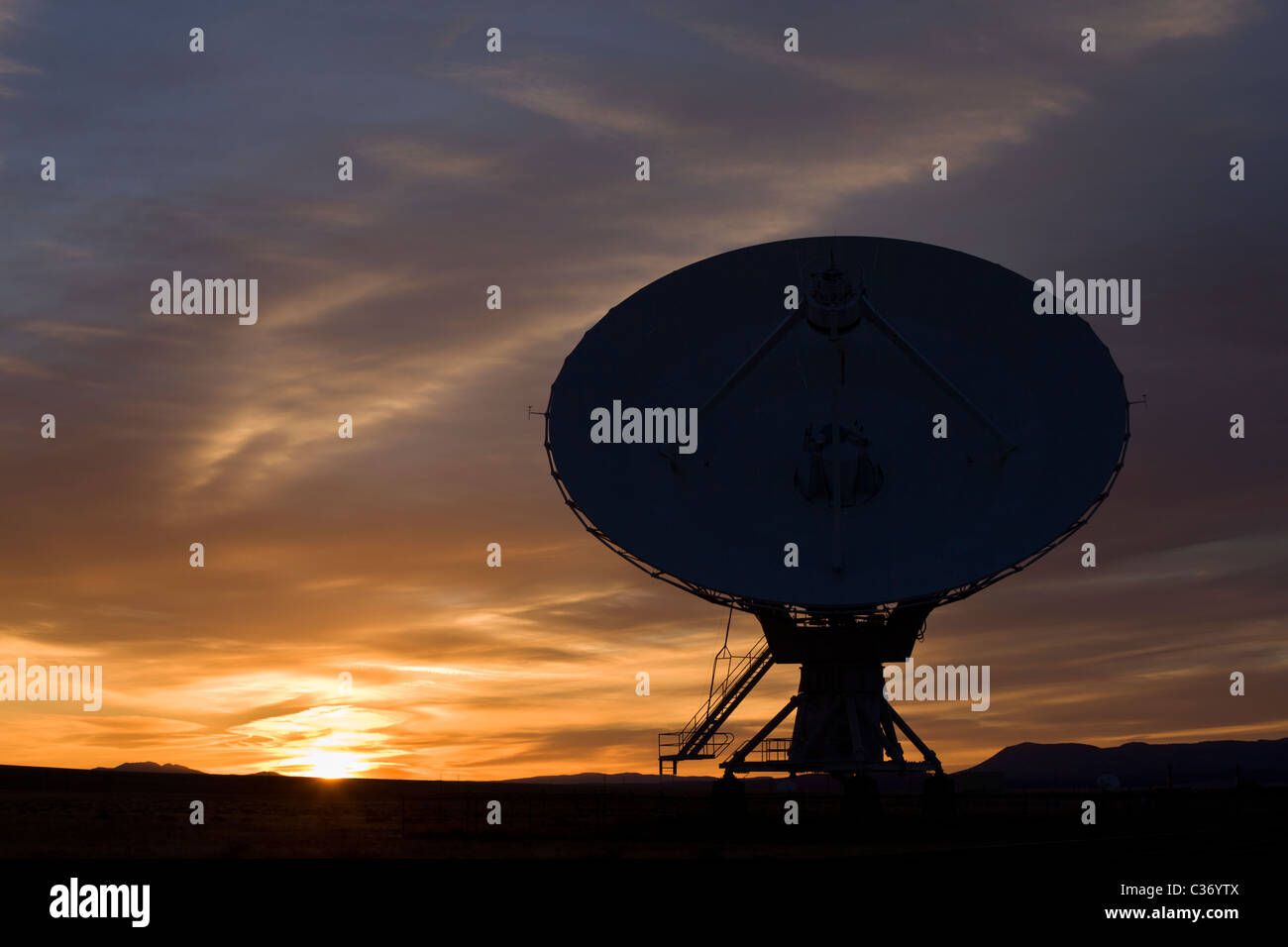 Silhouette of the Very Large Array (VLA) at sunset. National Radio Astronomy Observatory, New Mexico, USA. Stock Photo