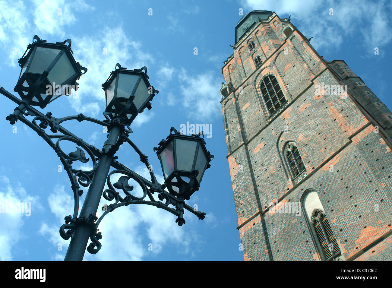 Saint Elizabeth gothic church tower and street lamp Wroclaw Poland Stock Photo